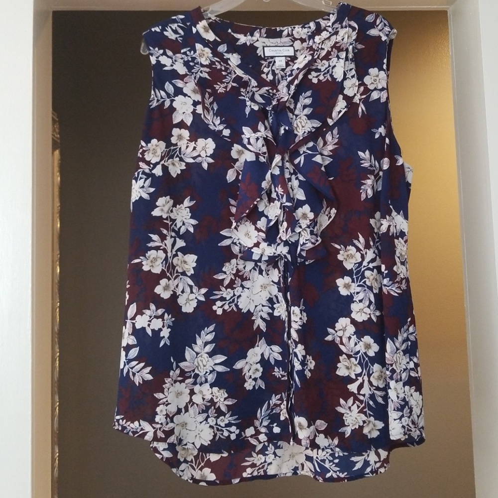 Sleeveless ruffle front blouse